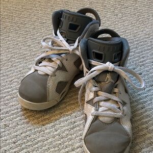 Kids Jordan Gray and White Sneakers